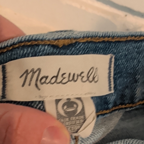 Madewell High-Rise Denim Shorts with a frayed hem in a blue wash. - Picture 4 of 9